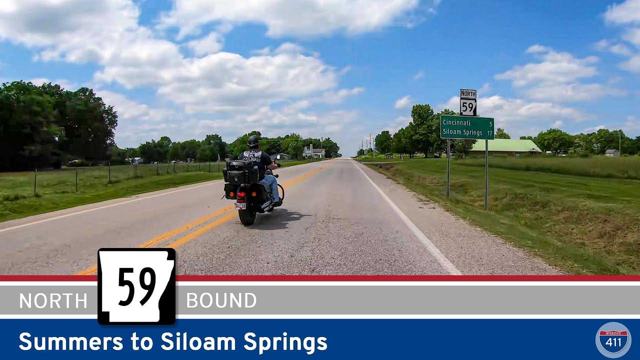 Drive America's Highways for 15 miles north along Arkansas Highway 59 from Summers to Siloam Springs.