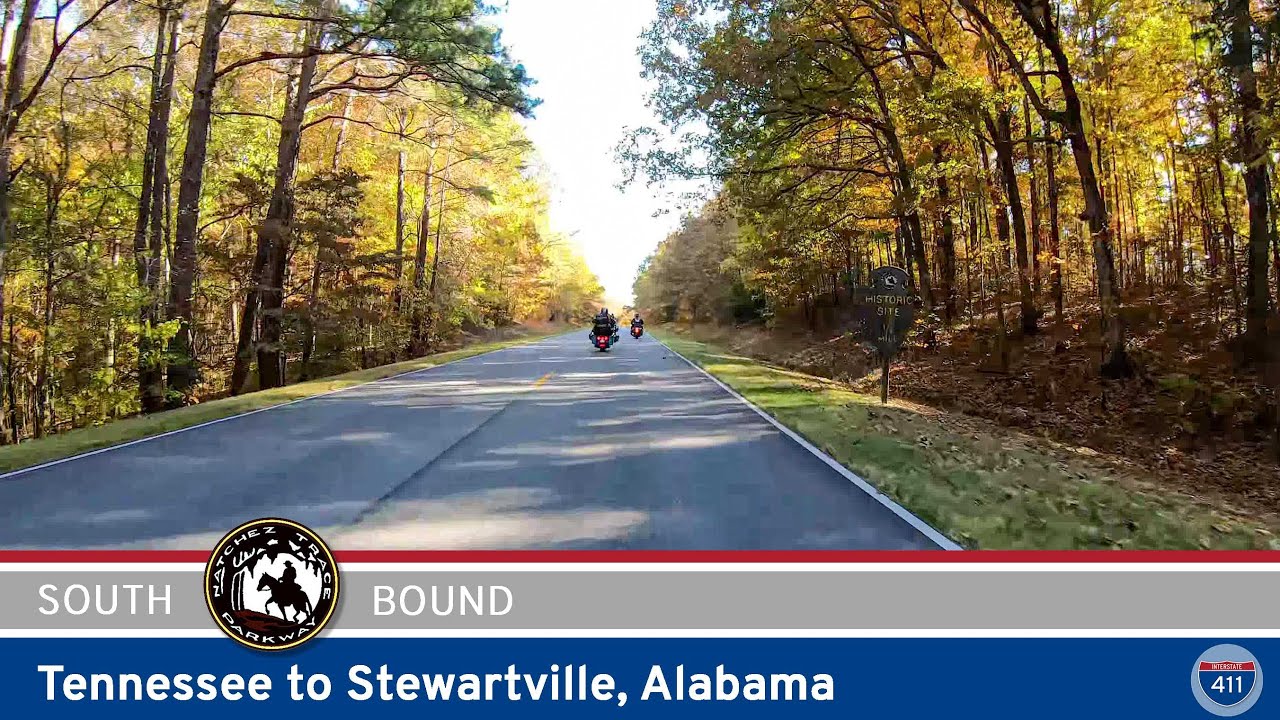 Drive America's Highways for 6 miles south along the Natchez Trace Parkway from Tennessee to Stewartville, Alabama